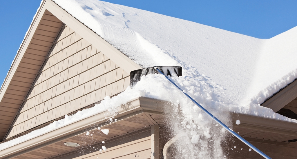 Snow on roof gutter guards paducah