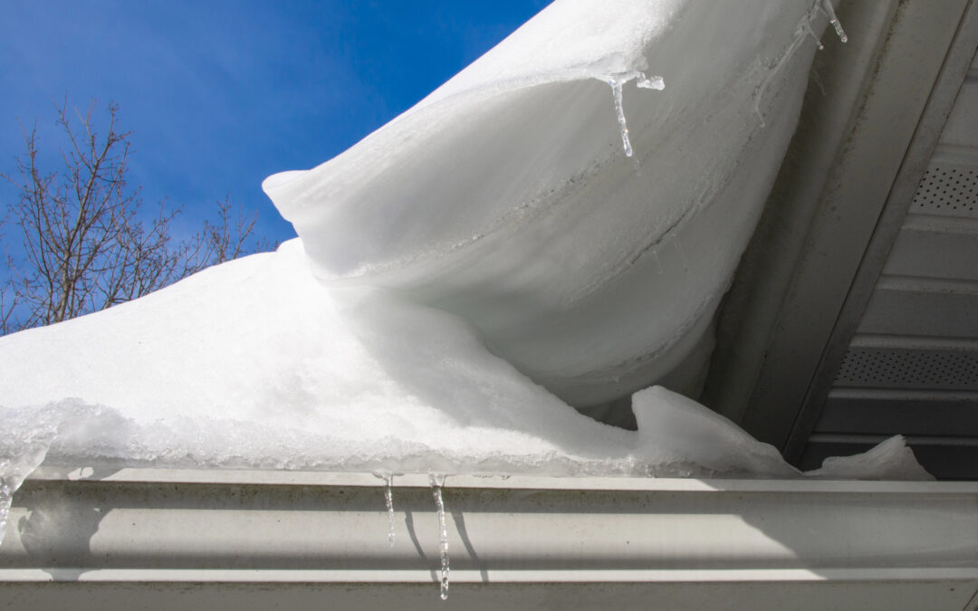 Snow and Ice on Your Roof? Your Gutters Could Be at Risk
